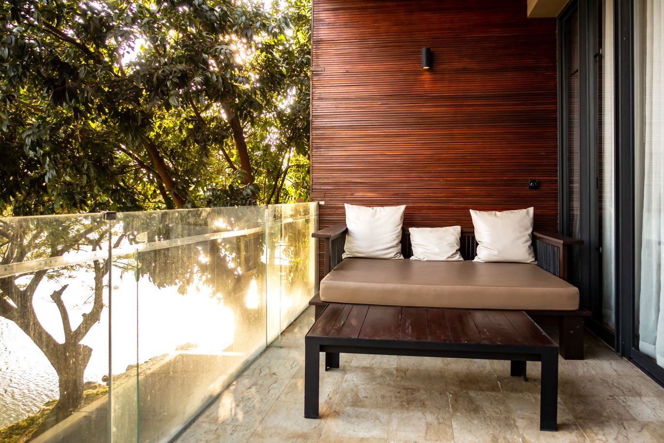 Downward Spotlight on the house balcony. Exterior Lighting.