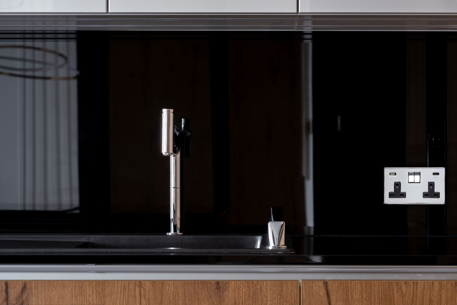 Polished chrome sockets kitchen interior