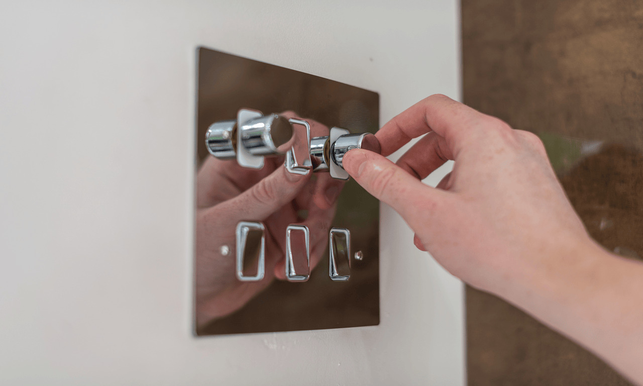 2 gang dimmer switch with switches installed on wall for adjustable lighting control